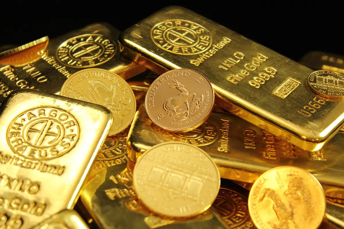 Goldbarren auf Euro-Banknoten – sofortige Barauszahlung beim Goldankauf bei Juwelier Grützmacher in Berlin